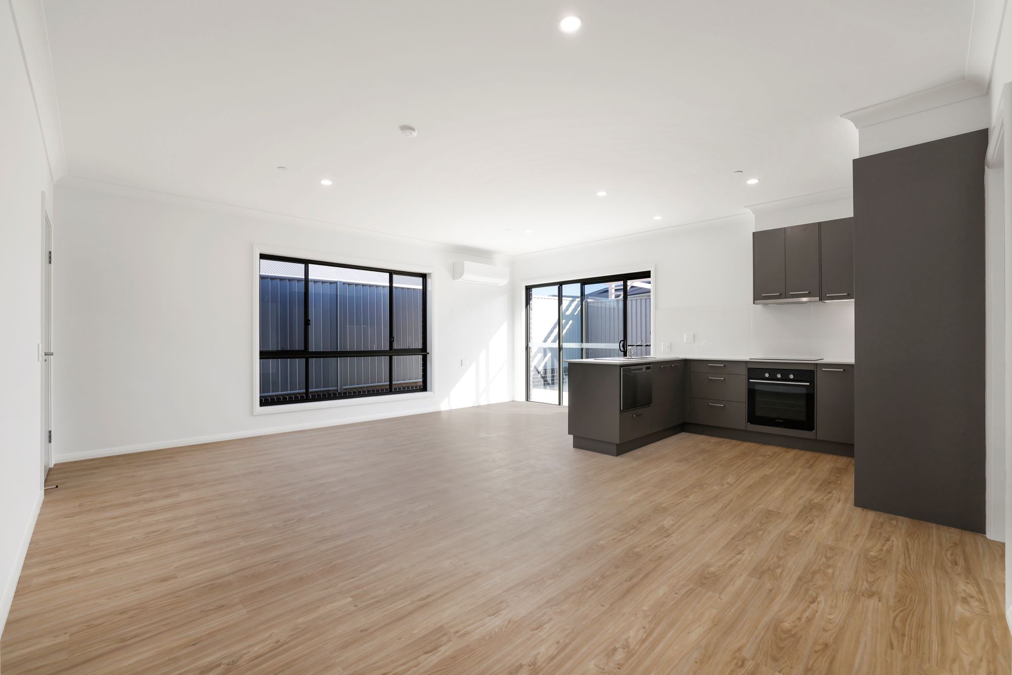 View of kitchen and open plan living area