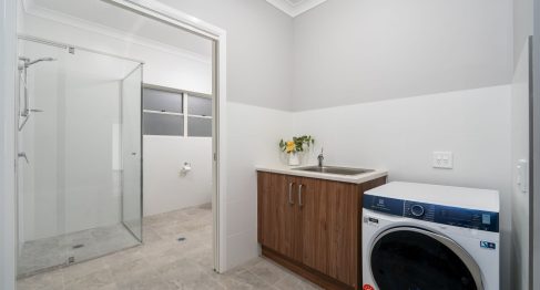 Staff bathroom and accessible laundry area